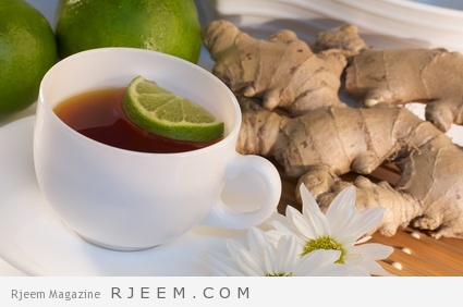 A cup of ginger tea with ingredients