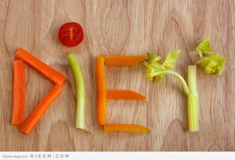 The word diet spelt out in vegetables on a wooden board.